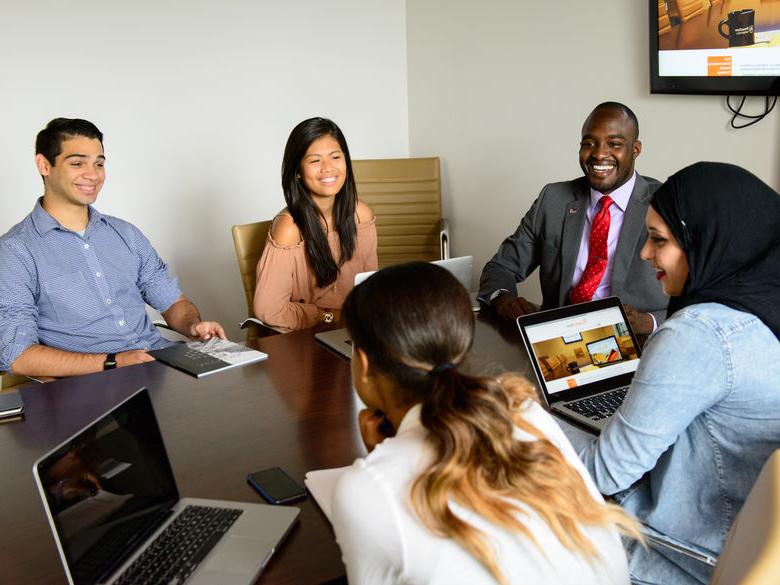 People sitting at a conference table